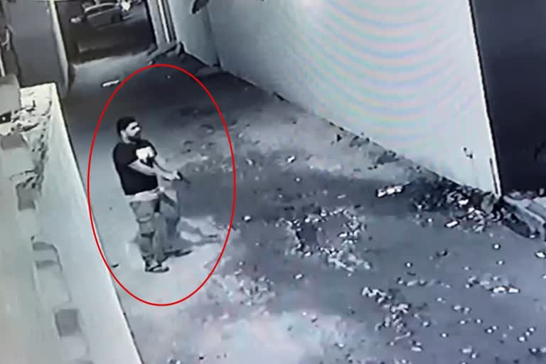 waving pistol in both hands picture of gangster captured in CCTV in chandigarh