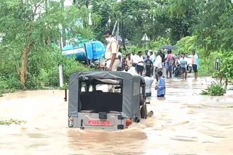 police vehicle stuck in floods