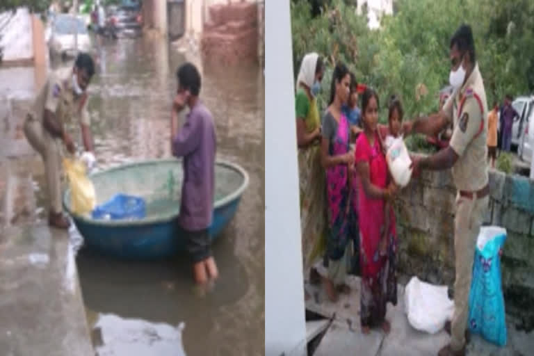 bowenpally-police-distributed-food-packets-to-people-in-the-flood-hit-area