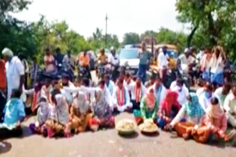 protest by farmers  to open grain buying centres at nalgonda