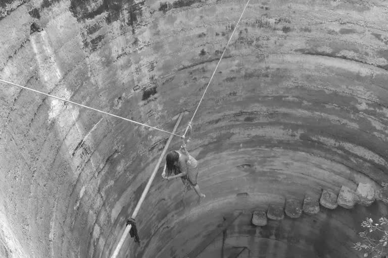 An old woman commits suicide by jumping into a well with aversion to life