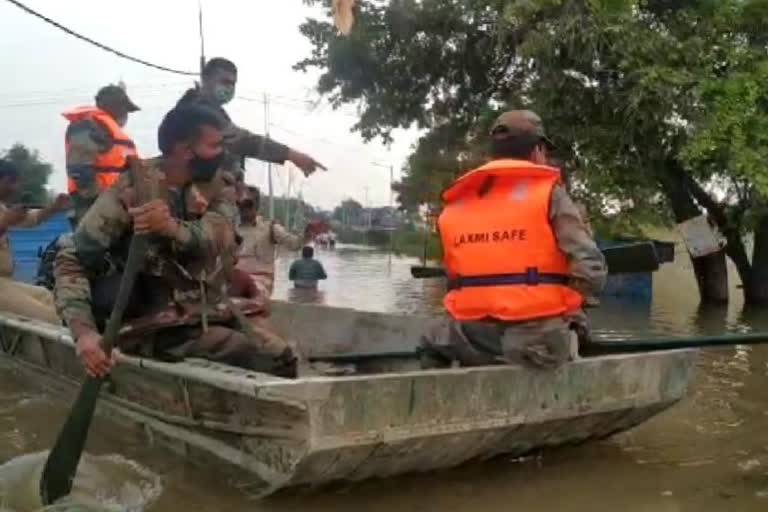 afzalpur Flood Victims Protection by Indian Warriors