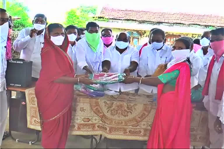 MLA Joguramanna distributed Batukamma saris to women in adilabad