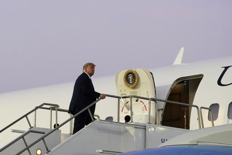 President Donald Trump boards Air Force One at Reno-Tahoe International Airport