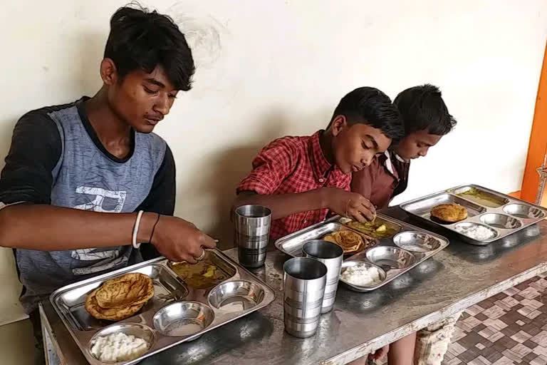 Children eating in dining room