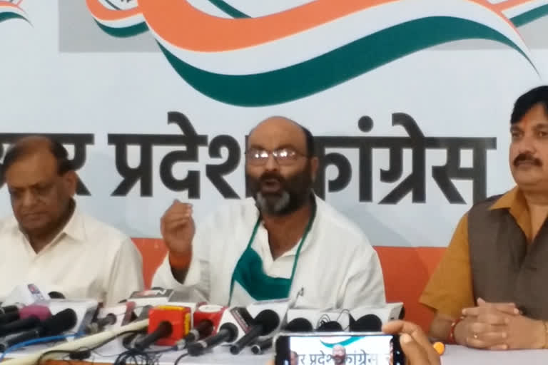 ajay kumar lallu addressing press conference.