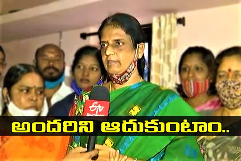 minister-sabitha-indra-reddy-helped-to-flood-victims-in-meerpet-at-rangareddy-district