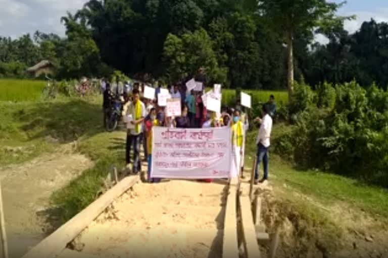 Protests over construction of dilapidated roads in tinisukia