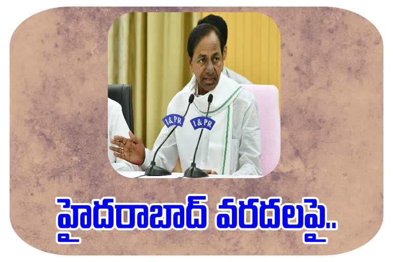 kcr review on hyderabad floods