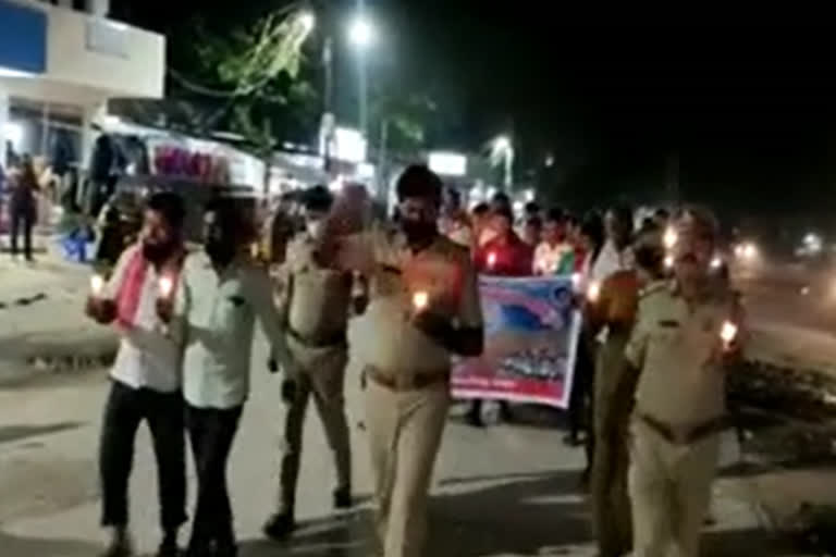 police candle rally at somamdepalli