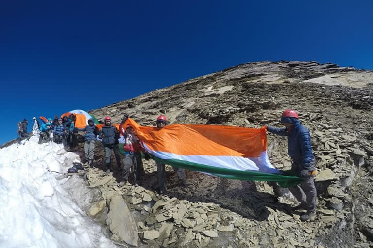 tricolor flag on Mount Friendship Peak