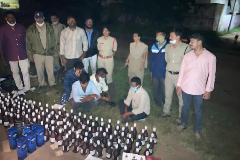 liquor bottles seized by police