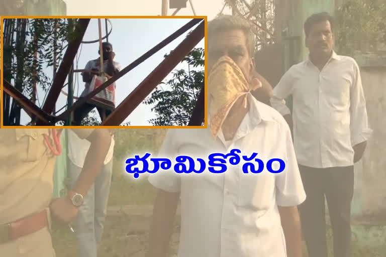 farmer protest on cell tower against revenue department in khammam district