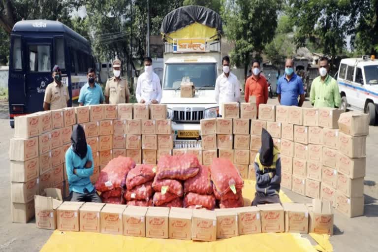 कांद्याच्या ट्रकचा दिखावा करत दारू वाहतूक