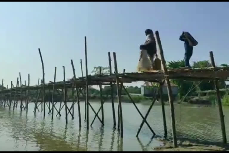 BROKEN  BAMOO BRIDGE AT DHUBURI