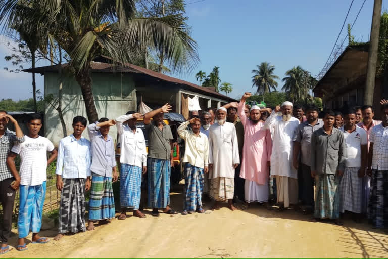 protest against murder at Karimganj