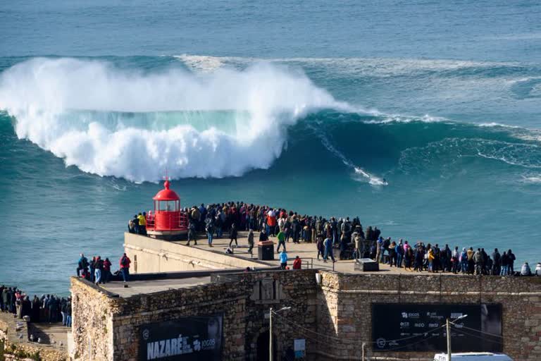 Video: Riders surf monster waves in Portugal