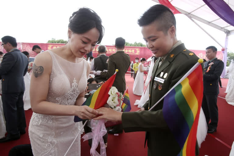 Two same-sex couples in military marry in first for Taiwan