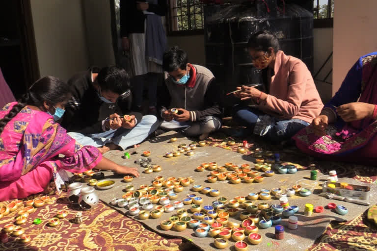 Special children making lamps for Diwali in Sundernagar