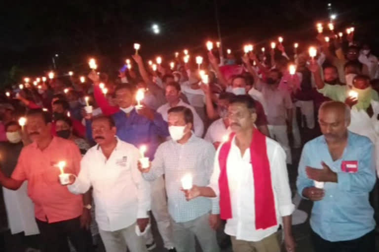 candle rally in guntakal railway station