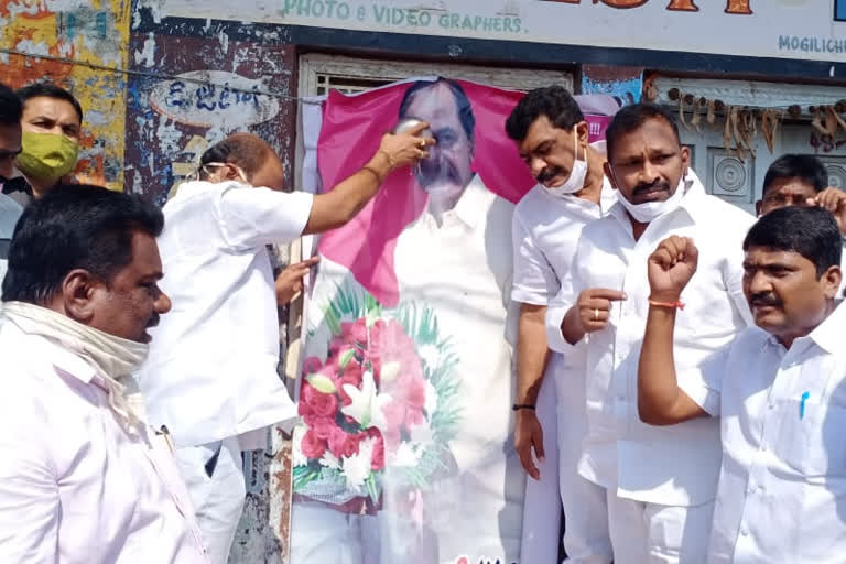 anointing to CM KCR photo in warangal rural district