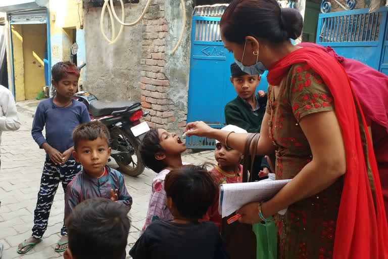 health department team administered plus polio medicine