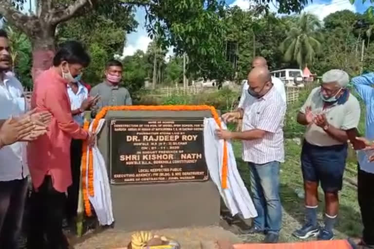 Model school building foundation stone borkhola