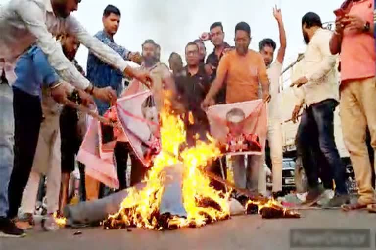 Burning effigy of french president