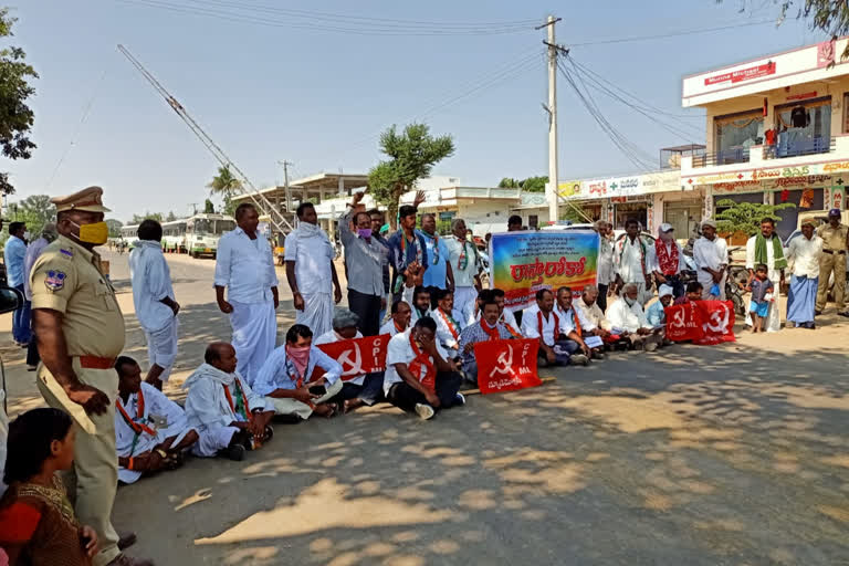 farmers protest in nirmal district against the central agri bills