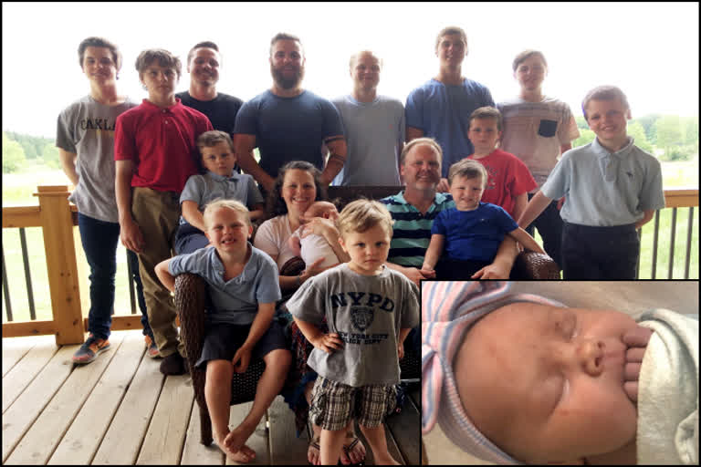 Michigan couple with 14 sons welcome their 1st daughter