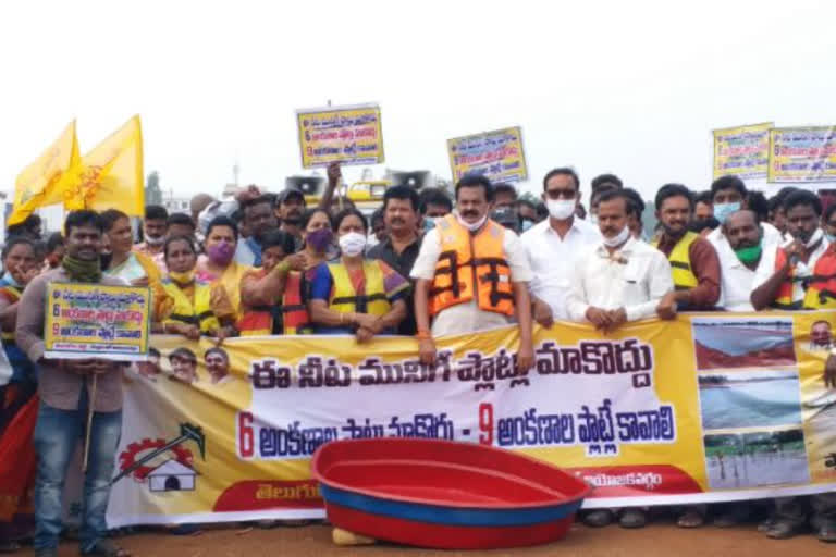 నీట మునిగే చోట ఇళ్ల స్థలాలు ఇవ్వొద్దు: తెదేపా