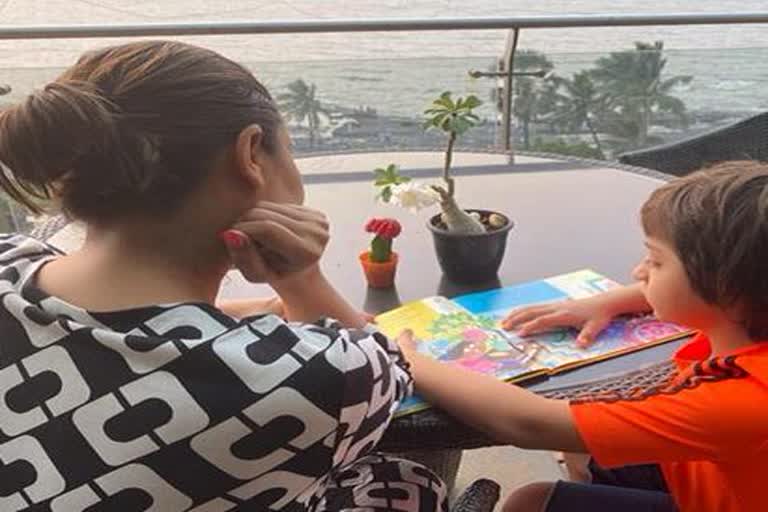 abram reading-karan-johar-book,gauri-shares-photo