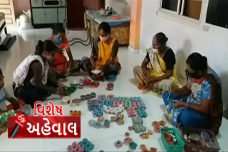 women-of-vasan-village-become-self-reliant-by-making-colorful-earthen-lamp