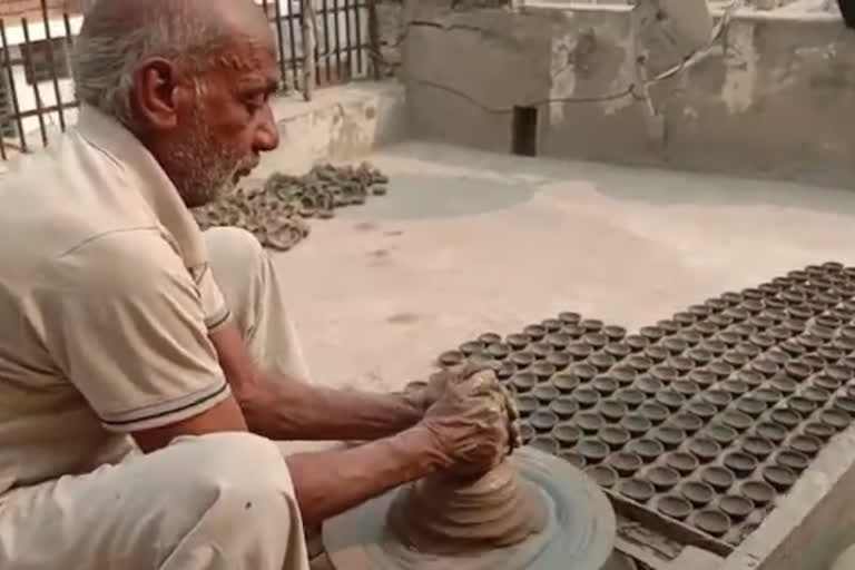 people buying electronic lights over earthen lamps in bhiwani