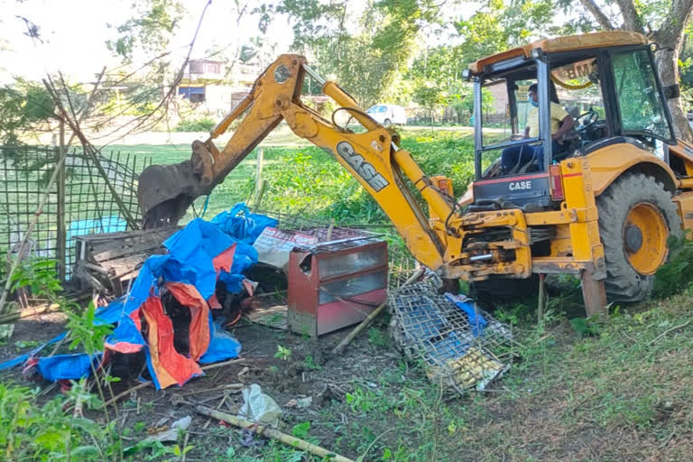 Eviction campaign of district administration around the historical talatal Ghar of Sivasagar