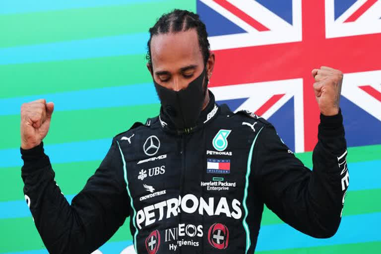 Britain’s Lewis Hamilton took a record-equalling seventh world championship