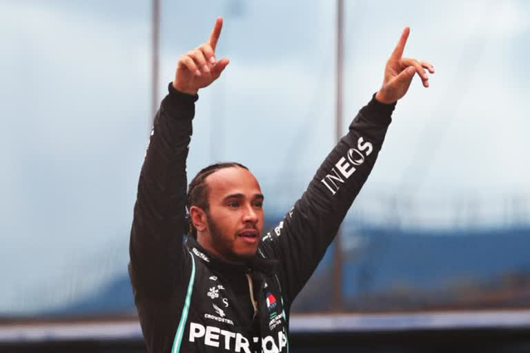 Mercedes driver Lewis Hamilton wins seventh championship to equal Schumacher's record