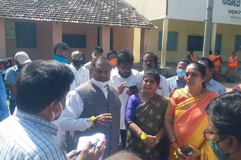 Minister KS Eshwarappa, who watched the repair work of government schools