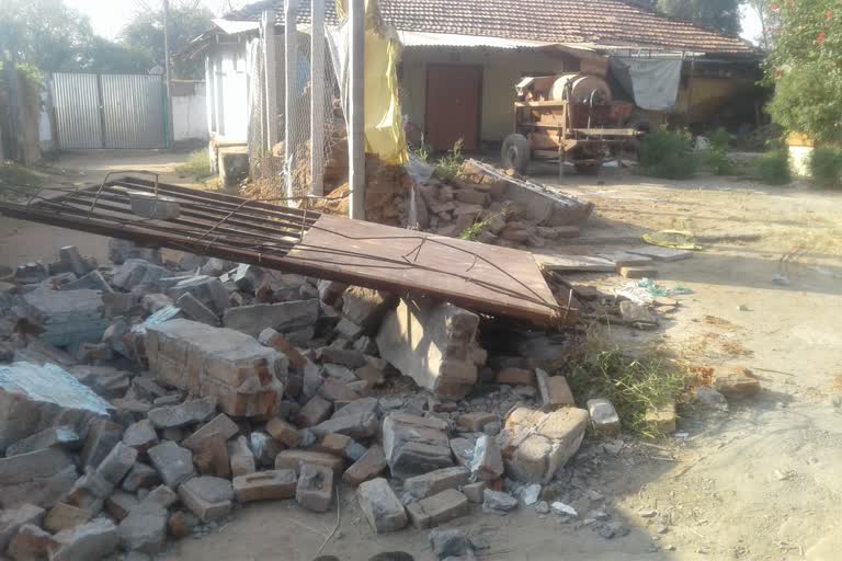 Wall collapsed due to tractor pushing