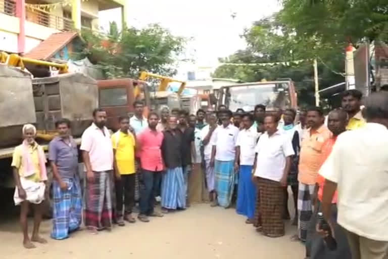 Public protest by capturing corporation garbage trucks causing traffic congestion!