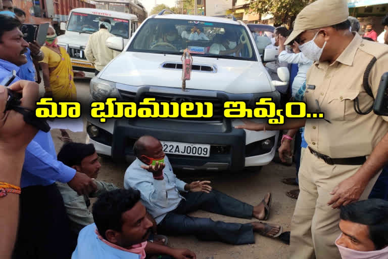 farmers protest for their land at huzurabad in karimnagar