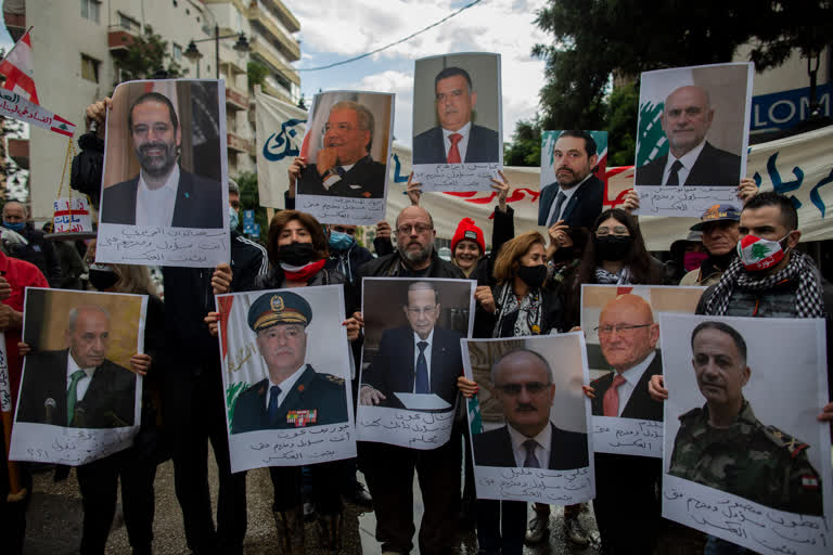 Rally held outside residence of head of Lebanon blast probe