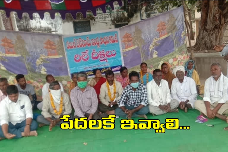 protest for double bedroom houses in nizamabad district