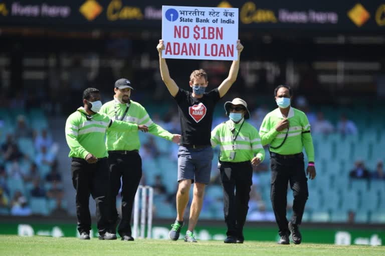 protest-against-adani-in-ind-vs-aus-match