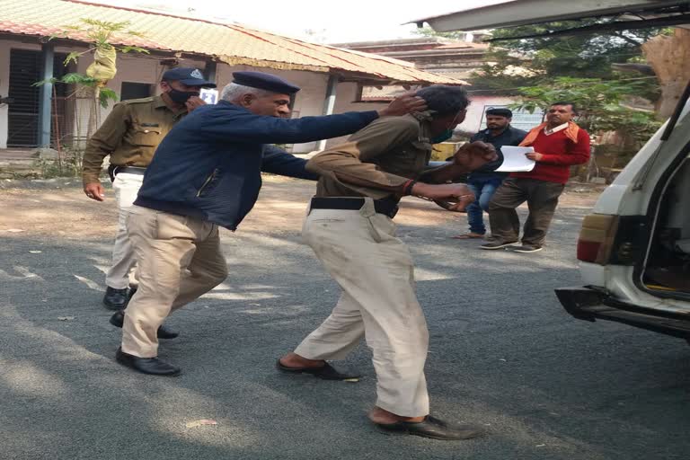 Policeman drinks liquor in treasury shop