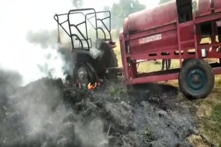 The tractor caught fire during the rice harvest