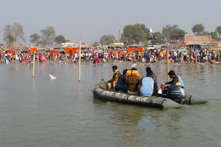 devotees gathered on bank of ganga in amroha