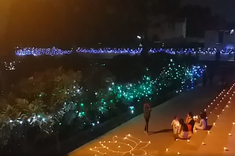 tikait rai pond decorated with lamps