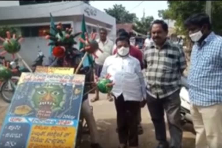 awareness program on corona with bike in nandigama