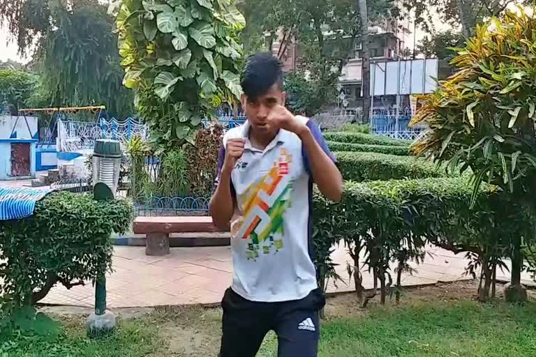 Boxer Sarabjit Singh is practicing in local park